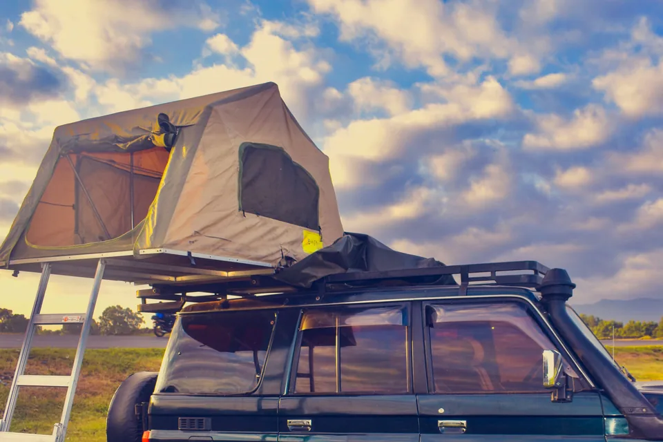 Land Cruiser with its rooftop tent open